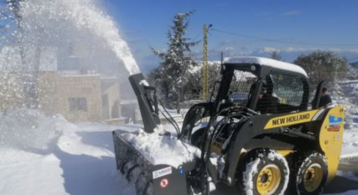 Tractor Removing Snow in Tanbourit