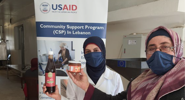 Community Support Program (CSP) Fadwa and Manal show off products with CSP